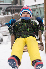 Image showing little boy having fun on winter day