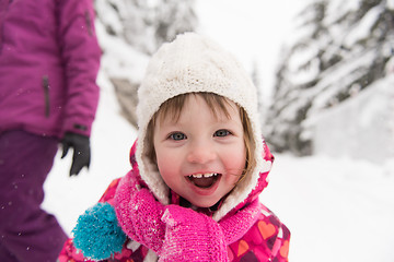 Image showing little girl at snowy winter day