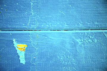 Image showing dirty stripped paint in  yellow rusty nail