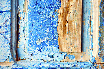 Image showing dirty   paint in   blue wood  rusty nail