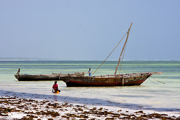 Image showing boat people and   lagoon relax  of zanzibar africa