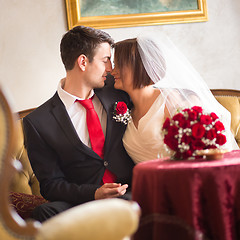 Image showing Beautiful wedding couple kissing.