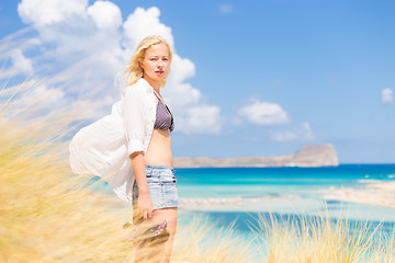 Image showing Free Happy Woman Enjoying Sun on Vacations.