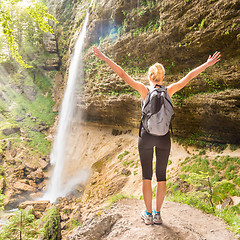 Image showing Active sporty woman relaxing in beautiful nature.