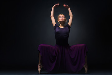 Image showing Young beautiful modern style dancer posing on a studio background