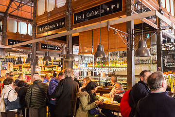 Image showing People drinking and eating at San Miguel market, Madrid.