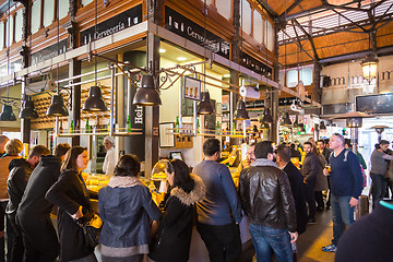 Image showing People drinking and eating at San Miguel market, Madrid.