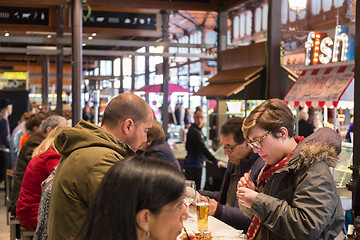 Image showing People drinking and eating at San Miguel market, Madrid.