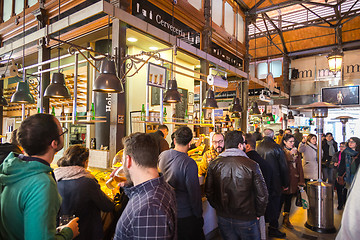 Image showing People drinking and eating at San Miguel market, Madrid.