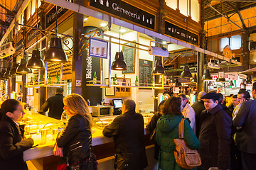 Image showing People drinking and eating at San Miguel market, Madrid.