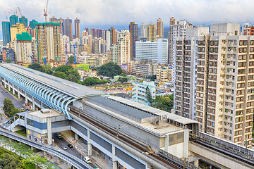 Image showing hong kong urban downtown and sunset speed train