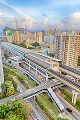 Image showing hong kong urban downtown and sunset speed train