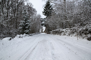 Image showing Snowy country road