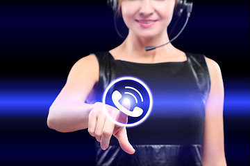 Image showing businesswoman, pressing button on touch screen interface and select call.   business concept.