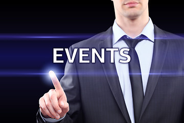 Image showing business, technology and networking concept - businessman pressing events button on virtual screens