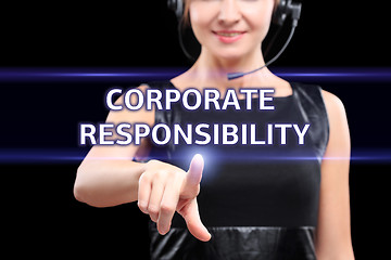 Image showing business, technology and networking concept - businesswoman pressing corporate responsibility button on virtual screens