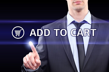 Image showing business, technology  concept - businessman pressing add to cart button on virtual screens