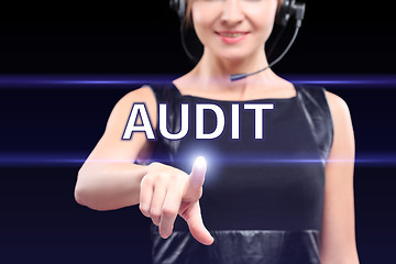 Image showing businesswoman pressing audit button on virtual screens, business concept.