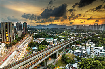 Image showing hong kong urban downtown and sunset speed train, Long Ping