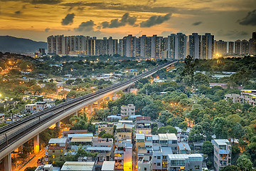 Image showing hong kong urban downtown and sunset speed train, Long Ping