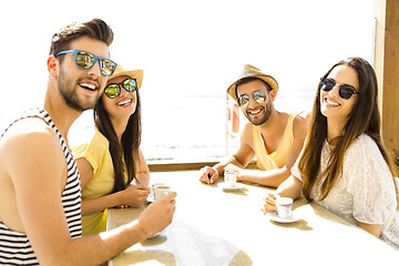 Image showing Friends at the beach bar