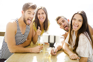 Image showing Group selfie at the beach bar