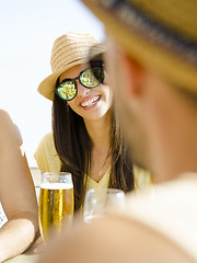 Image showing Friends at the beach bar