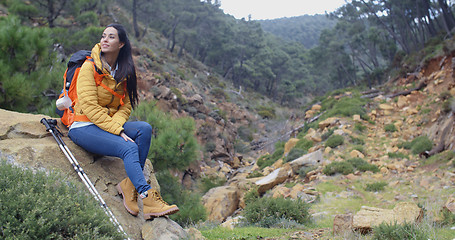 Image showing Young backpacker relaxing to enjoy the view