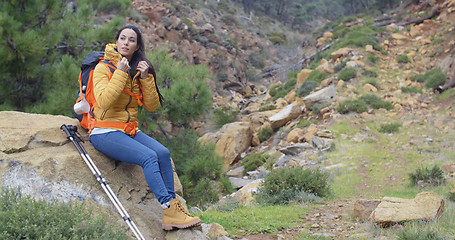 Image showing Young backpacker relaxing to enjoy the view