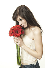 Image showing woman with gerbera