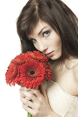 Image showing woman with gerbera