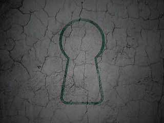 Image showing Data concept: Keyhole on grunge wall background