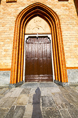 Image showing  lombardy    in   villa cortese   old   church   brick tower wal