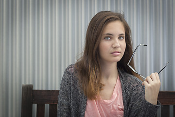 Image showing Portrait of Melancholy Young Girl with Glasses