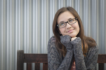 Image showing Daydreaming Young Girl Looking Up and To The Side