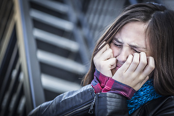 Image showing Young Crying Teen Aged Girl on Staircase