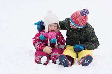 Image showing group of kids having fun and play together in fresh snow