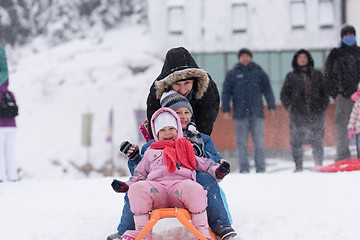 Image showing group of kids having fun and play together in fresh snow