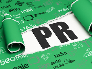 Image showing Advertising concept: black text PR under the piece of  torn paper