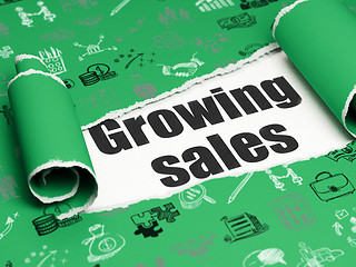 Image showing Business concept: black text Growing Sales under the piece of  torn paper