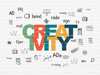 Image showing Advertising concept: Creativity on wall background