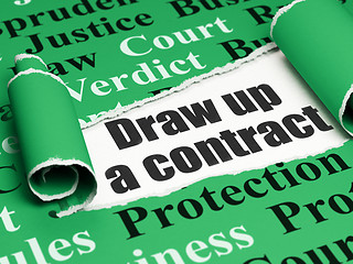 Image showing Law concept: black text Draw up A contract under the piece of  torn paper