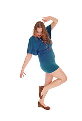 Image showing Woman dancing is dress.