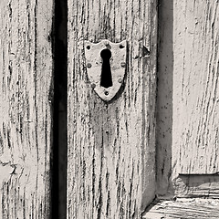 Image showing door    in italy old ancian wood and traditional  texture nail