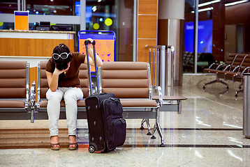 Image showing Woman missed the plane