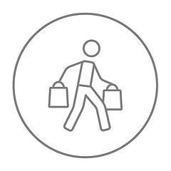 Image showing Man carrying shopping bags line icon.