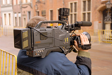 Image showing cameraman in action