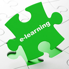 Image showing Studying concept: E-learning on puzzle background