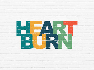 Image showing Medicine concept: Heartburn on wall background