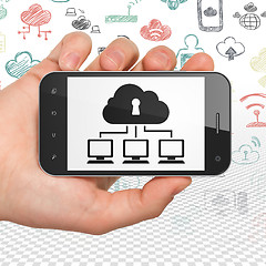 Image showing Cloud technology concept: Hand Holding Smartphone with Cloud Network on display